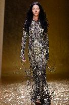 MFW Maria Carla Boscono walks the runway at the Roberto Cavalli MP