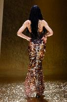 MFW Amelia Gray Hamlin walks the runway at the Roberto Cavalli MP
