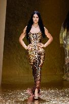 MFW Amelia Gray Hamlin walks the runway at the Roberto Cavalli MP