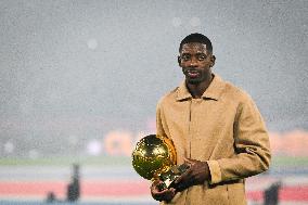 Ousmane Dembele celebrates his Ballon dOr at Parc des Princes - FA