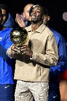 Ousmane Dembele Presents Ballon d'Or At PSG v Auxerre Match - Paris