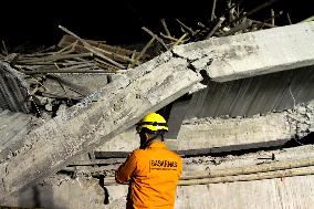 School Collapse Leaves One Student Dead, 38 Missing - Indonesia