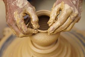 Indian Potter Gives Final Touches to Karva Pot - Ajmer