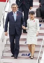 Japan PM Ishiba returns home
