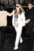 PFW - Charlize Theron Leaving La Reserve Hotel