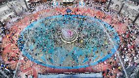 Tourists Attend Water-Splashing Event - Jinghong