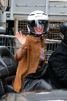 PFW - Emma Watson Leaving Miu Miu Show On Moto Taxi