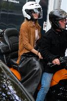 PFW - Emma Watson Leaving Miu Miu Show On Moto Taxi