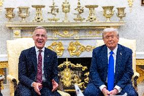 US President Donald J. Trump meets with Canadian Prime Minister Mark Carney