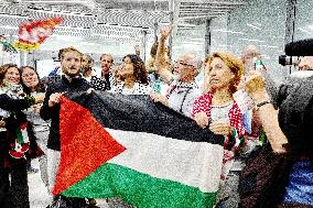 Rima Hassan and activists welcomed at Orly Airport