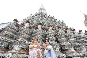 Tourists in Thai Traditional Costumes - Bangkok