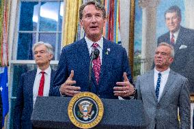 US President Donald Trump announces a drug pricing deal during a press conference in the Oval Office