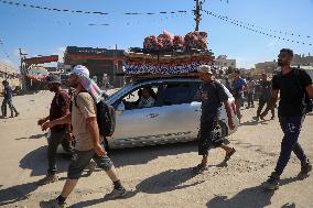 Palestinians Returning to Gaza City - Palestine