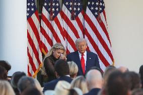 Donald J Trump presents Erika Kirk with the Presidential Medal of Freedom for her late husband Charlie Kirk