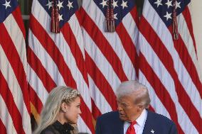 Donald J Trump presents Erika Kirk with the Presidential Medal of Freedom for her late husband Charlie Kirk