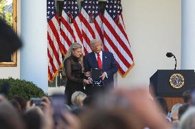 Donald J Trump presents Erika Kirk with the Presidential Medal of Freedom for her late husband Charlie Kirk