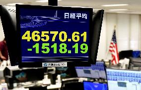Tokyo stocks tumble
