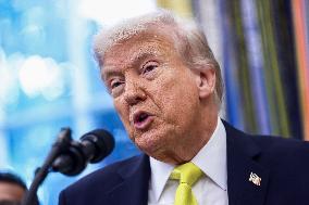 US President Donald Trump and FBI Director Kash Patel speak in the Oval Office