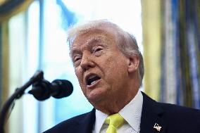 US President Donald Trump and FBI Director Kash Patel speak in the Oval Office