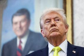 US President Donald Trump and FBI Director Kash Patel speak in the Oval Office