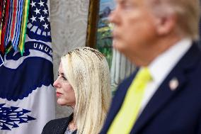 US President Donald Trump and FBI Director Kash Patel speak in the Oval Office