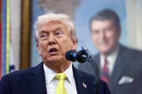 US President Donald Trump and FBI Director Kash Patel speak in the Oval Office