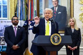 US President Donald Trump and FBI Director Kash Patel speak in the Oval Office