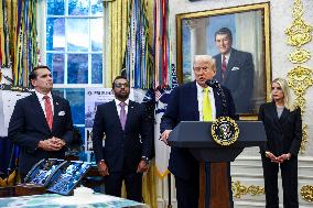 US President Donald Trump and FBI Director Kash Patel speak in the Oval Office