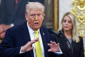 US President Donald Trump and FBI Director Kash Patel speak in the Oval Office