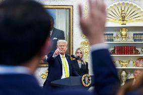 US President Donald Trump and FBI Director Kash Patel speak in the Oval Office