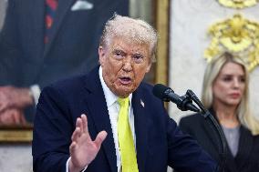 US President Donald Trump and FBI Director Kash Patel speak in the Oval Office