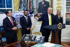 US President Donald Trump and FBI Director Kash Patel speak in the Oval Office