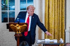 Trump speaks at a fundraiser for his ballroom extension