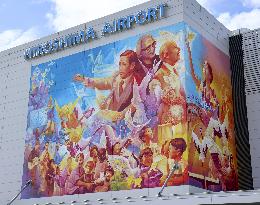 Peace mural on Hiroshima airport external wall