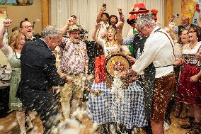 Prime Minister Taps Keg At Oktoberfest - Canada