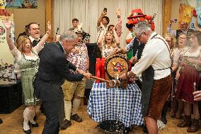 Prime Minister Taps Keg At Oktoberfest - Canada
