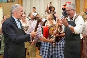 Prime Minister Taps Keg At Oktoberfest - Canada