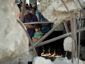 Gazans Pray Amid Destruction - Khan Yunis