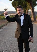 Antonio Banderas Toasts With The Press After The Wedding Of His Daughter - Spain