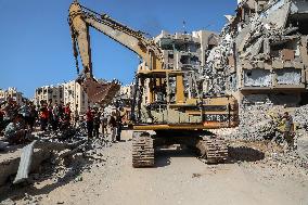 A Bulldozer Is Used In Search Of Bodies Of Israeli Hostages - Gaza