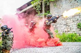 Armed Police Officers And Soldiers  Conduct Drills