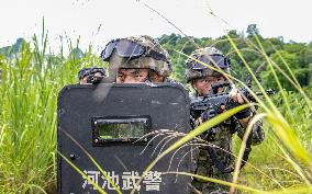 Armed Police Officers And Soldiers  Conduct Drills