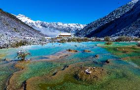 A Colorful Pond Cluster After Snow - China