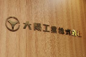 Taiyo Kogyo signboard and logo