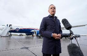 Mark Carney Speaks To Press Before Boarding Plane - Ottawa
