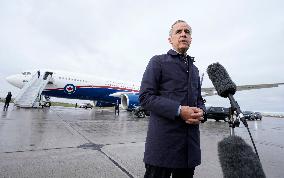 Mark Carney Speaks To Press Before Boarding Plane - Ottawa