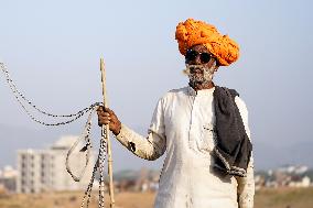 The Coolest Camel Herder of The Annual Camel Fair - Pushkar