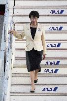 Japan PM Takaichi returns home