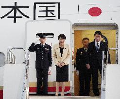 Japan PM Takaichi returns home