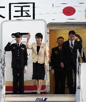 Japan PM Takaichi returns home